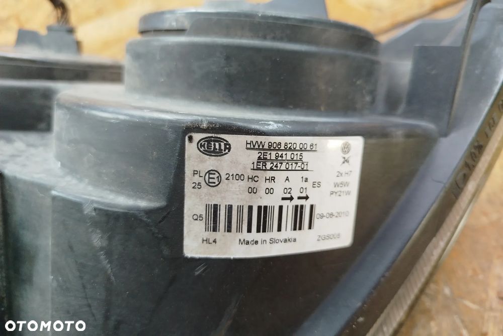 lampa przód lewa HELLA kompletna do lekkiej polerki do Vw Crafter I 06- 2E1941015, wszystkie uchwyty na miejscu - 10