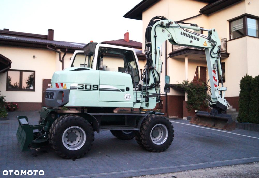 Liebherr 309 LITRONIC / KLIMA / LAKIER ORGINAŁ / NOWE OPONY  (311 312 TEREX CAT ) - 1