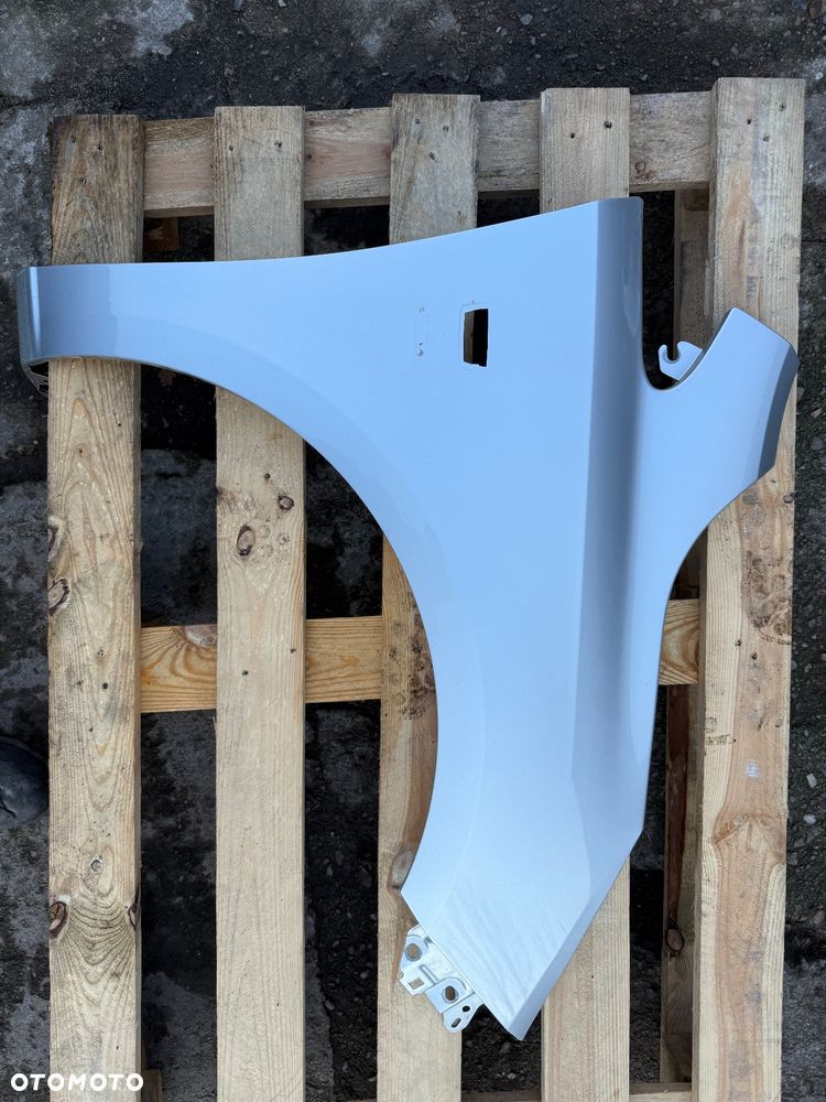 BŁOTNIK PRZÓD PRAWY OPEL CORSA E 13434577