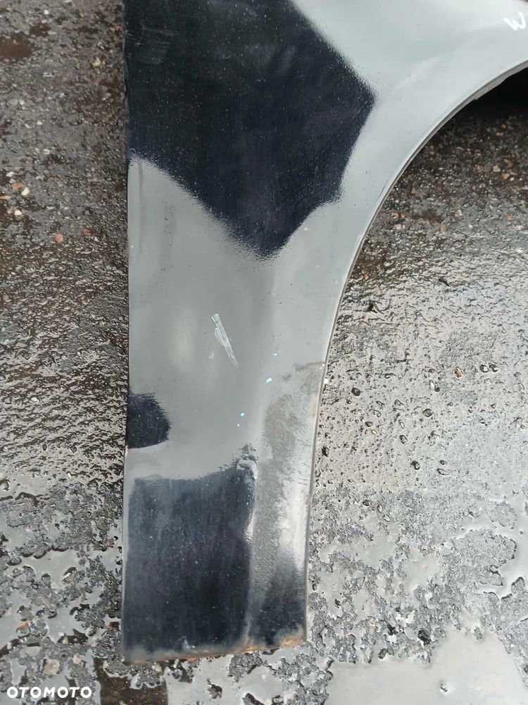 Volkswagen Polo 9N lift Błotnik prawy. - 2