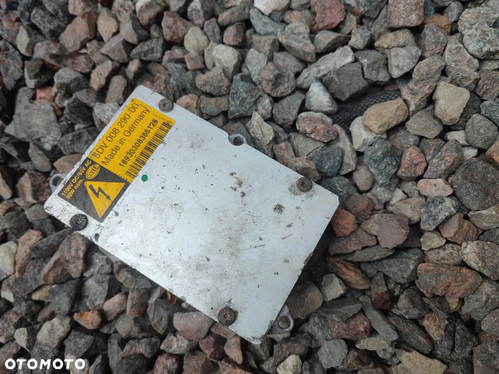 BMW E53 / E60 / E61 / E65 / E66 / E85 / E86 ORYGINALNA PRZETWORNICA XENON POD ŻARÓWKĘ D2S MARKI HELLA 5DV 008 290 -00 O NR. 63 12 6 907 488 / 63 12 0 150 614 / 63 12 6 916 100 OEM SPRAWNA W 100% - 3