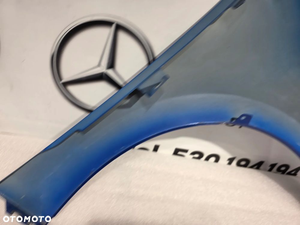 OPEL CORA F 19- LEWY BŁOTNIK PRZEDNI PRZÓD NR AUKCJI BŁ322 - 18