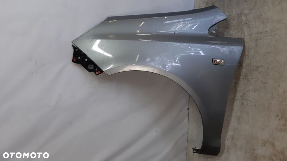 * OPEL CORSA D BŁOTNIK PRZEDNI PRZÓD LEWY Z163 SZARY - 1