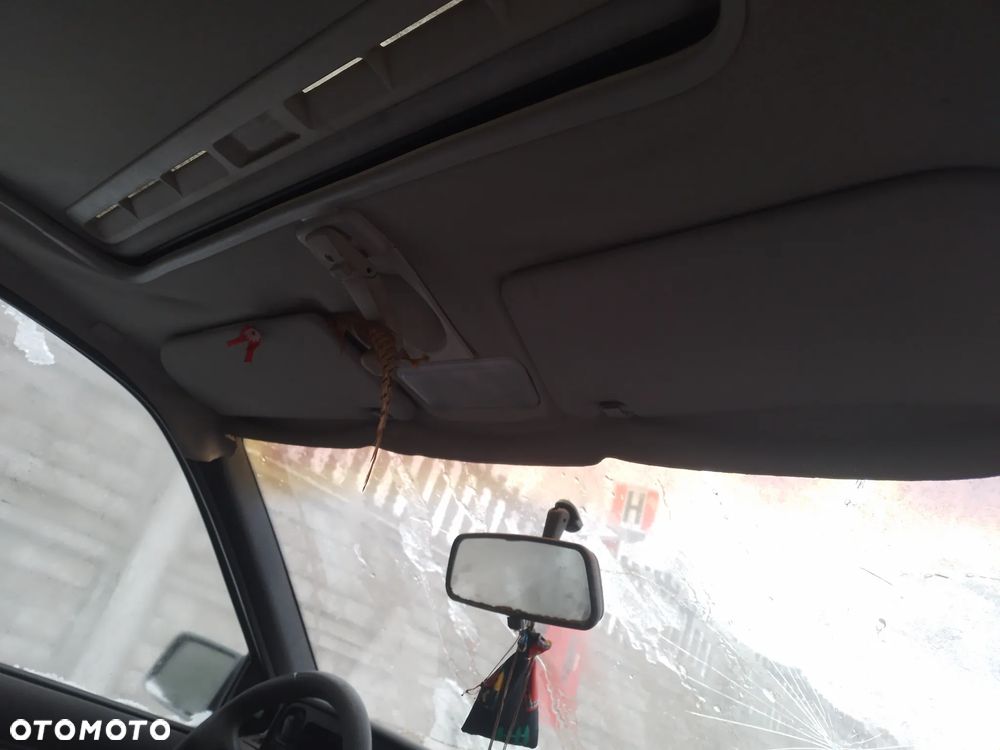 OPEL KADETT E LIFT 89-91    OSŁONA PRZECIWSŁONECZNA PRAWA LEWA - 1