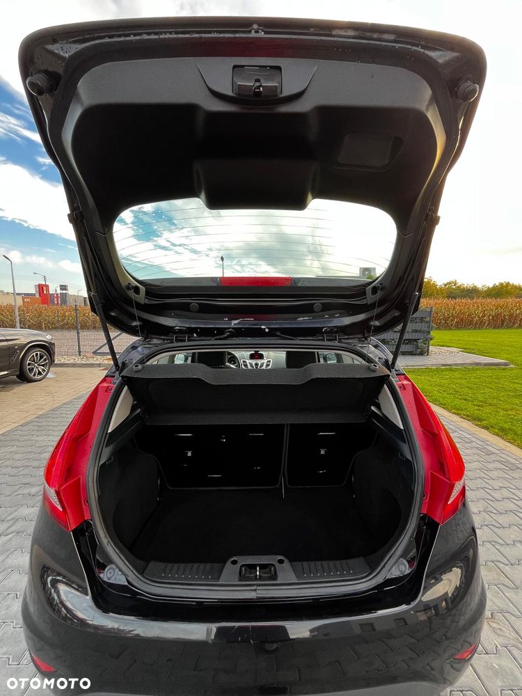 Ford Fiesta 1.4 Ghia - 31