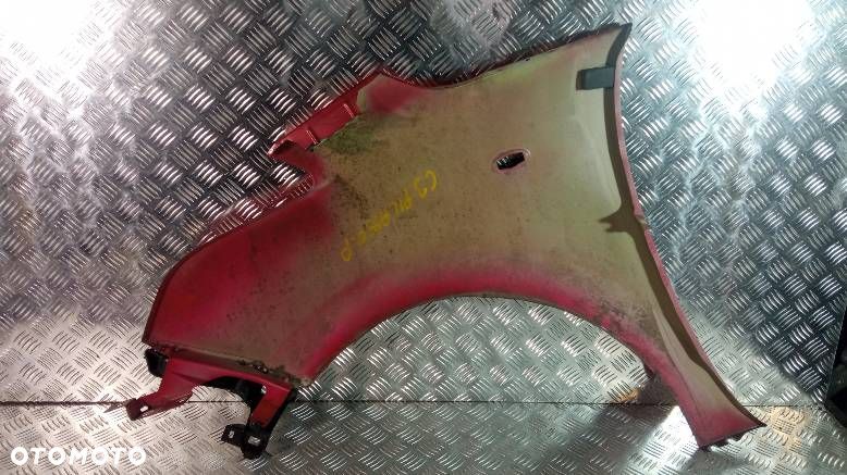 BŁOTNIK PRAWY PRZEDNI CITROEN C3 PICASSO 1.4I - 2