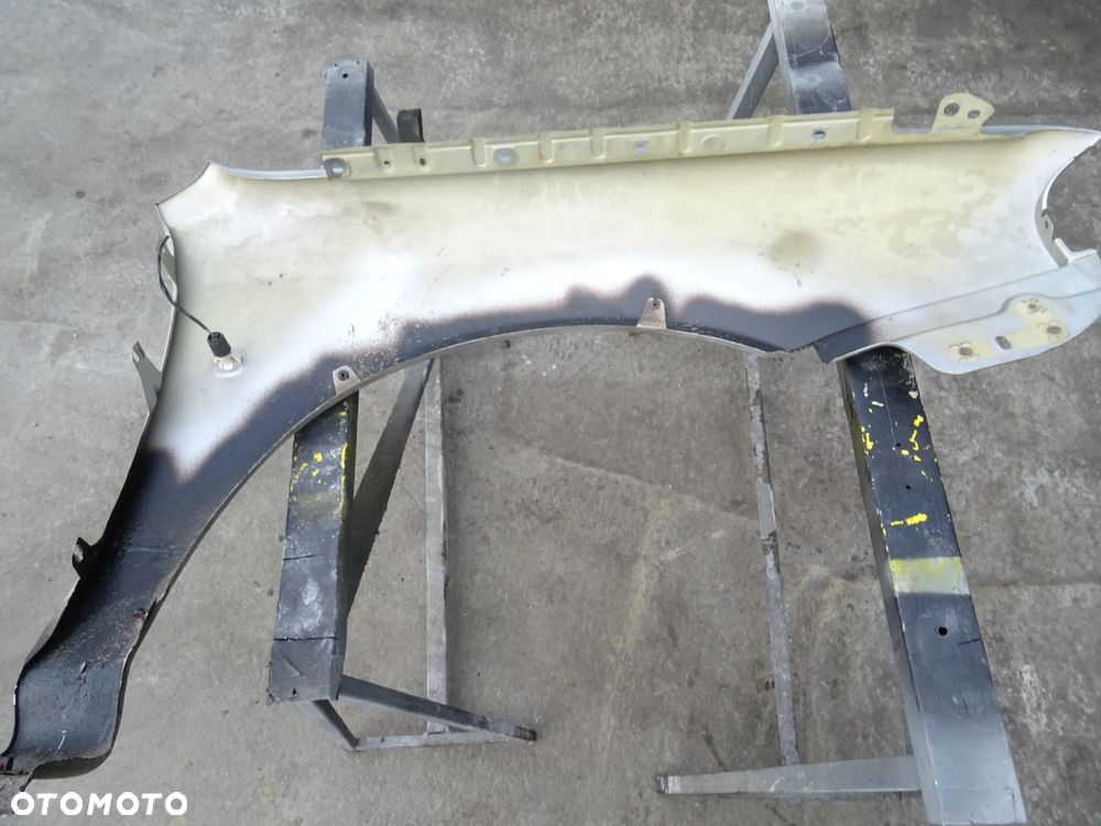 Błotnik Skoda Octavia Lewy Przód 9102 - 7