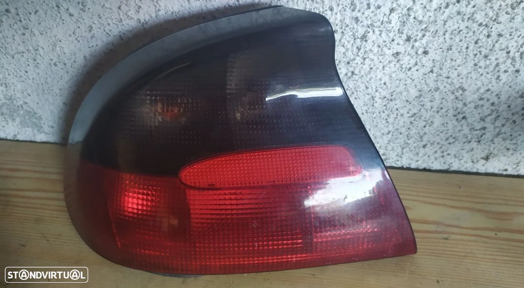 FAROLIM OPEL TIGRA A - ESQUERDO - 1