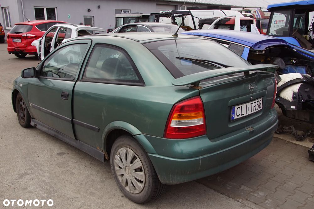 Auto na części - Opel Astra II G 1.6 16V 100 KM X16XEL F17 Z374 1998R Silnik Skrzynia Drzwi Maska Błotnik Zderzak Lampa Lusterko Klamka Szyba Deska Kokpit Sterownik Moduł Czujnik Licznik Panel Kierownica - 4