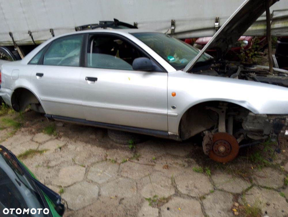Audi A4 B5 (94-01r.) 1.8 B 125KM. Silnik ADR Skrzynia CPD lakier LY7T . Cały na części. GWARANCJA !!!  Przód Tył Zestaw Komplet Drzwi Klapa Zderzak Błotnik Maska Grill Atrapa Szyba Pas Lampa Lusterko Boczki Fotel Kanapa Kokpit Deska Rozdzielcza Przełącznik Włącznik Sterownik Przewody Wiązka Instalacja Moduł Komputer Czujnik Listwa Pompa Alternator Wtryski Głowica Rozrusznik Kompresor Sprzęgło Dwumas Silnik Skrzynia ABS Klimatyzacji Paliwa Wspomagania Kolektor Turbina Przepustnica Zawór Chłodnica Koło Hak Belka Sanki Zawieszenie Mcpherson Półoś Amortyzator Wydech Tłumik Zacisk Most - 3