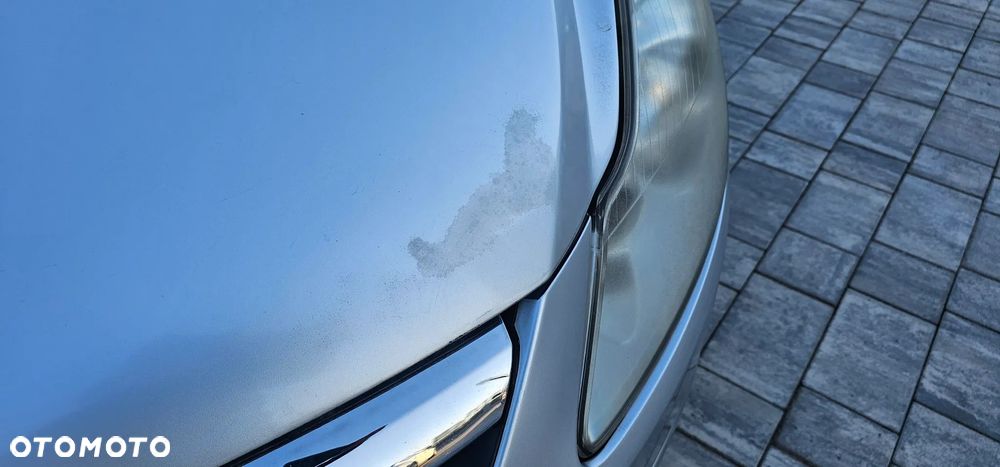 Opel Corsa 1.2 16V Enjoy - 10