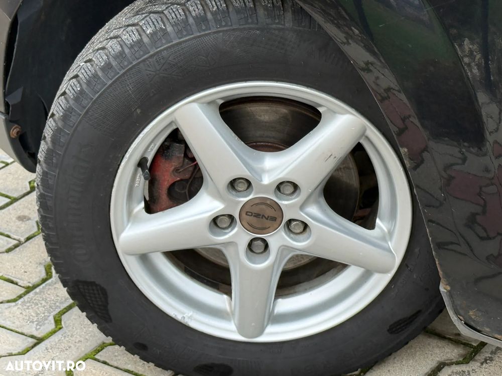 Ford Focus 1.8 Fun X - 11