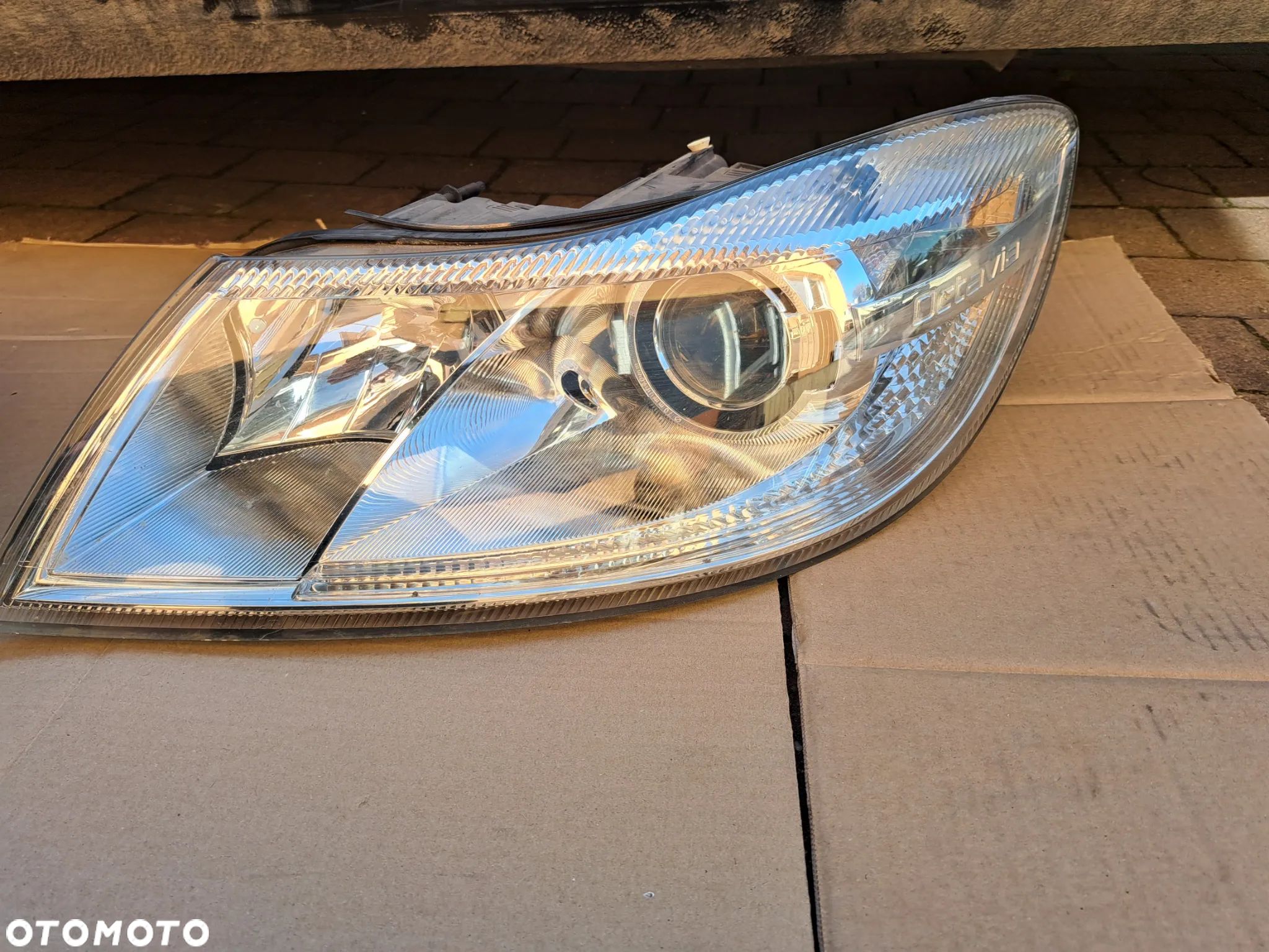 Skoda Octavia II lift lampa lewa xsenon1Z1941015G - 1