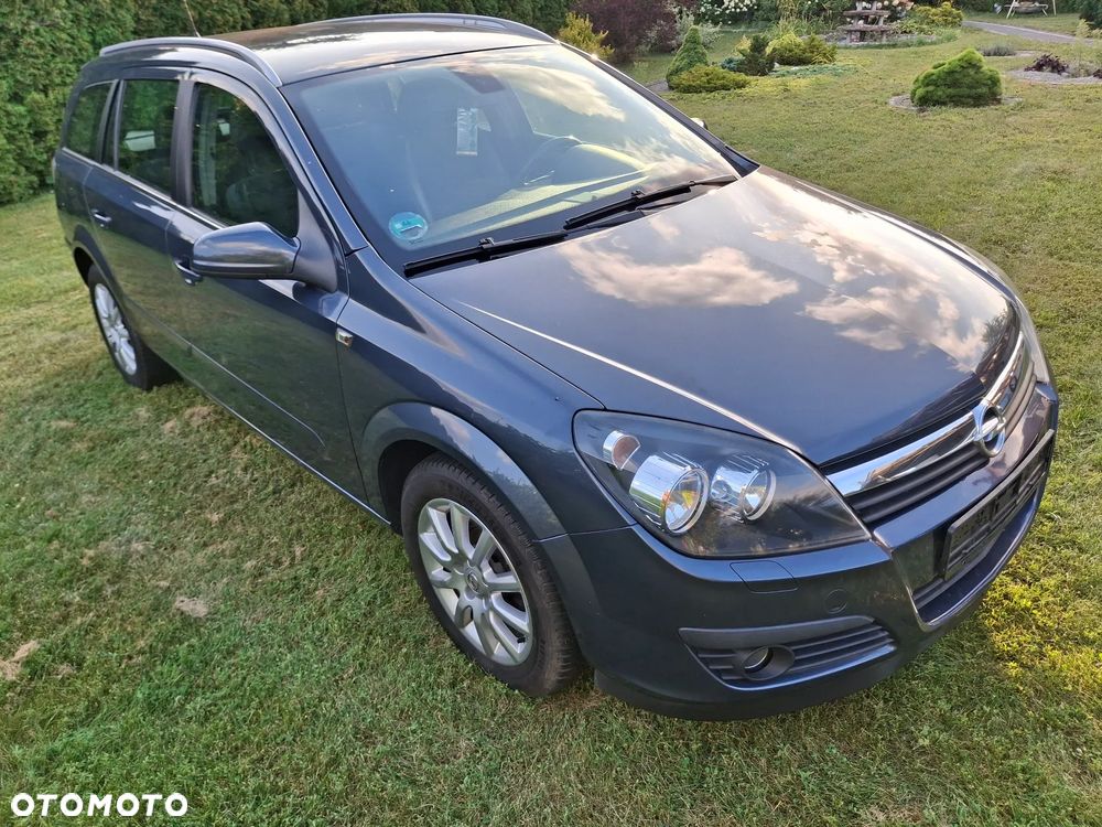 Opel Astra 1.8 Caravan Cosmo - 12