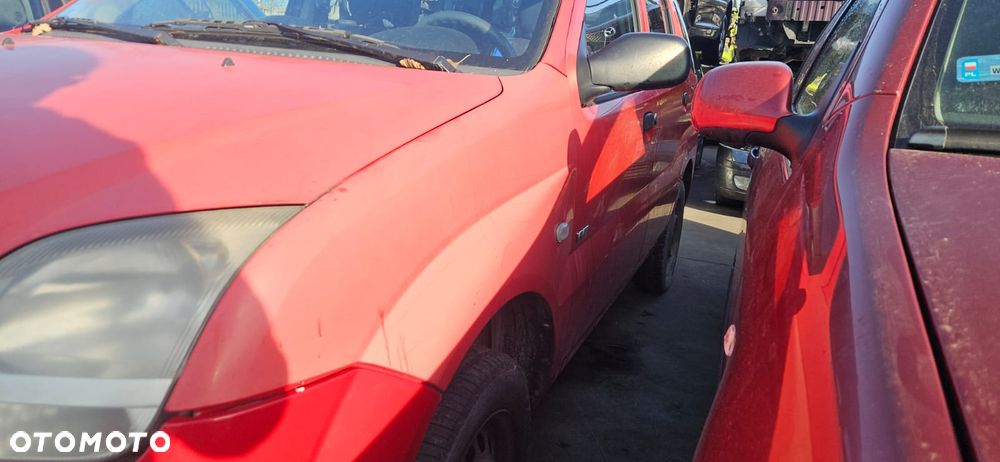 SUZUKI IGNIS II 03-10 1.3 M13A OSŁONA PRZECIWSŁONECZNA PRAWA LEWA - 9