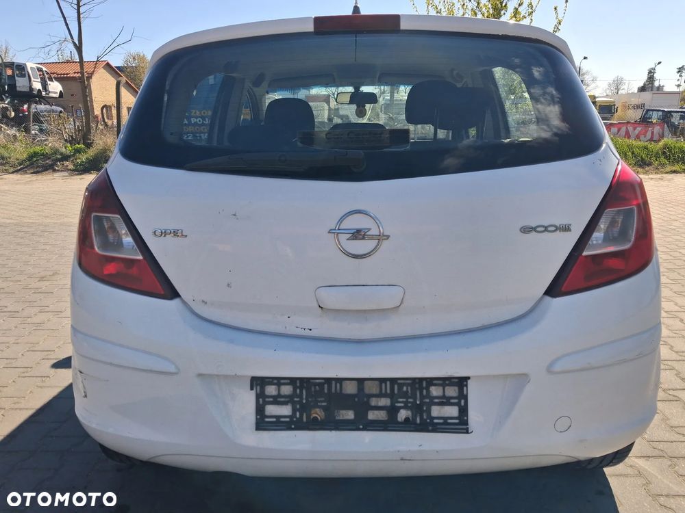 Opel Corsa D 3 silnik kompletny 1.3 CDTI diesel skrzynia biegów F17 W394 drzwi klapa zderzak błotnik kolor biały Y474 sprzęgło szyba deska wyświatlacz pas fotel podsufitka alternator maglownica pompa sterownik panel sterownik mcperson wahacz zwrotnica belka sanki przewód wąż wiązka poduszka lampa reflektor zamek zacisk radio stacyjka boczek obudowa osłona tłumik wydech kolektor wtrysk czujnik NA CZĘŚCI - 11
