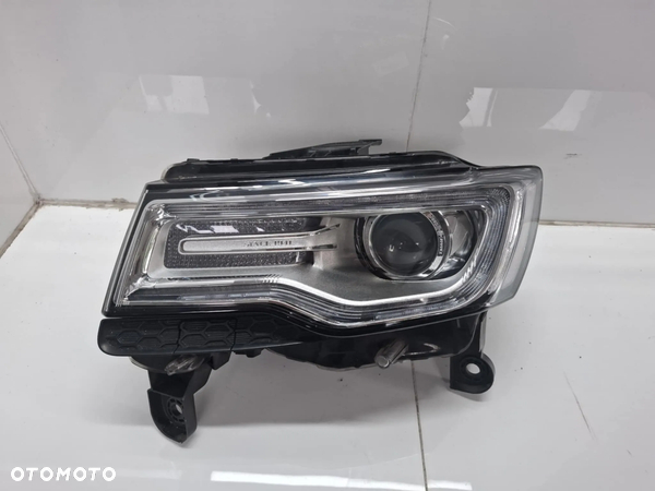 LEWA LAMPA PRZEDNIA PRZÓD JEEP GRAND CHEROKEE WK2 XENON 14-