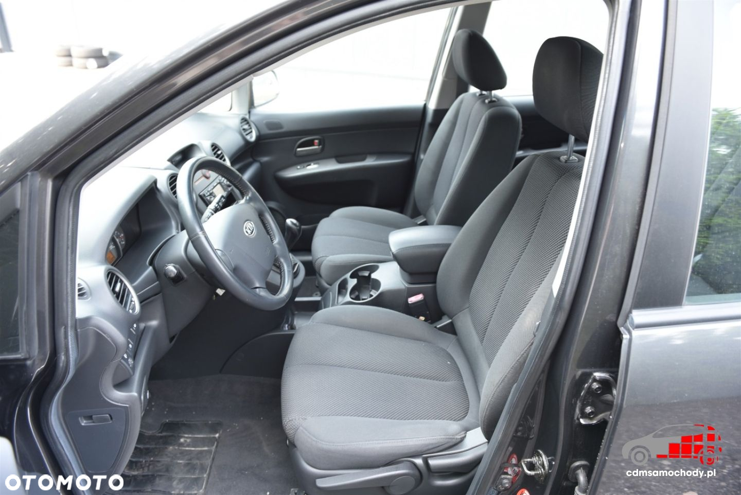 Kia Carens - 13