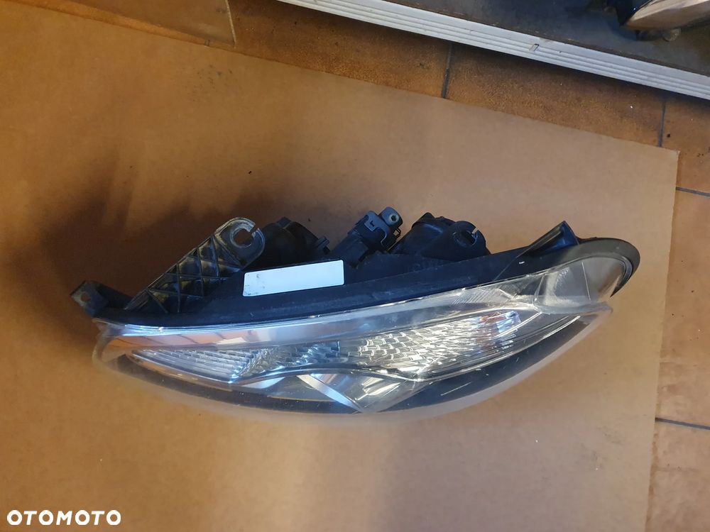 REFLEKTOR LEWY NISSAN QASHQAI J10 LIFT XENON - 3