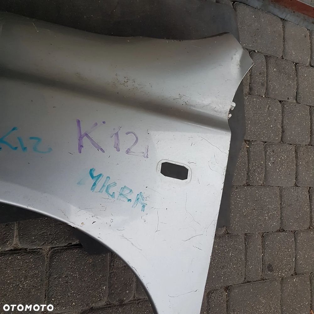 błotnik nissan micra k12 lewy oryginal - 13