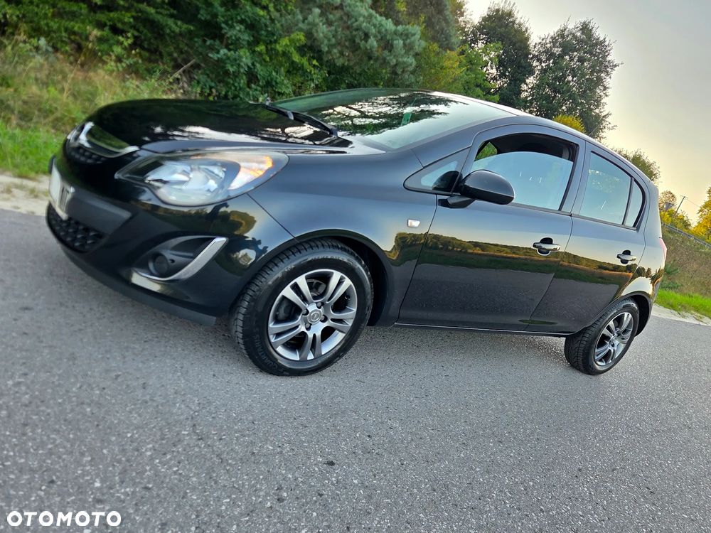 Opel Corsa 1.2 16V Enjoy - 11