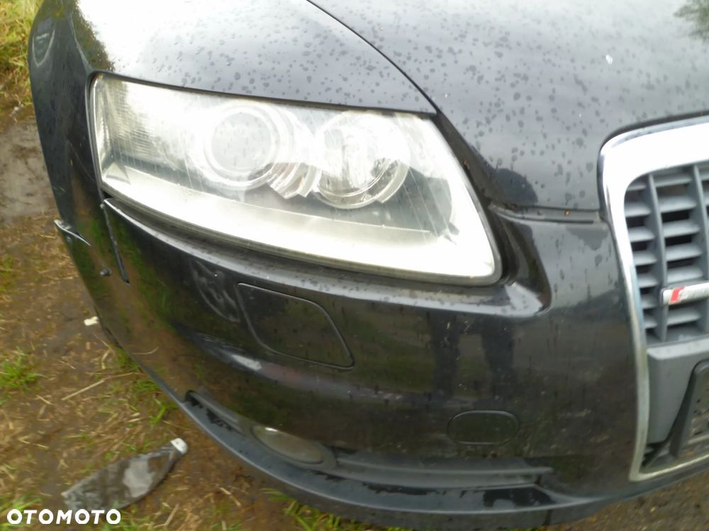 REFLEKTOR XENON AUDI A6 C6 PRAWY - 1