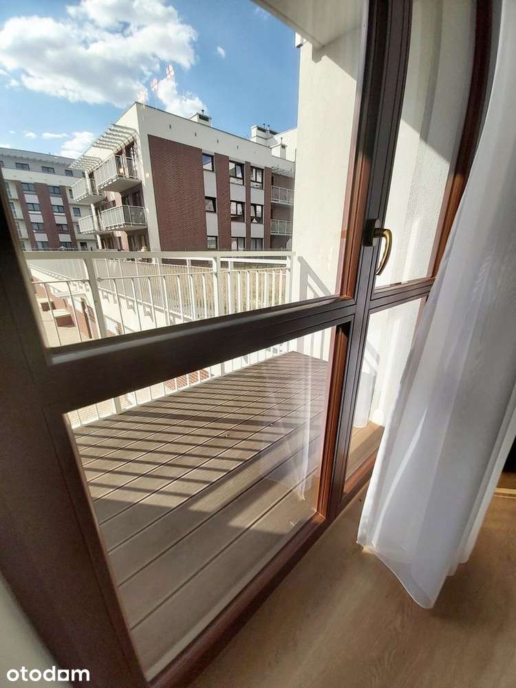 Komfortowy apartament z balkonem i garażem