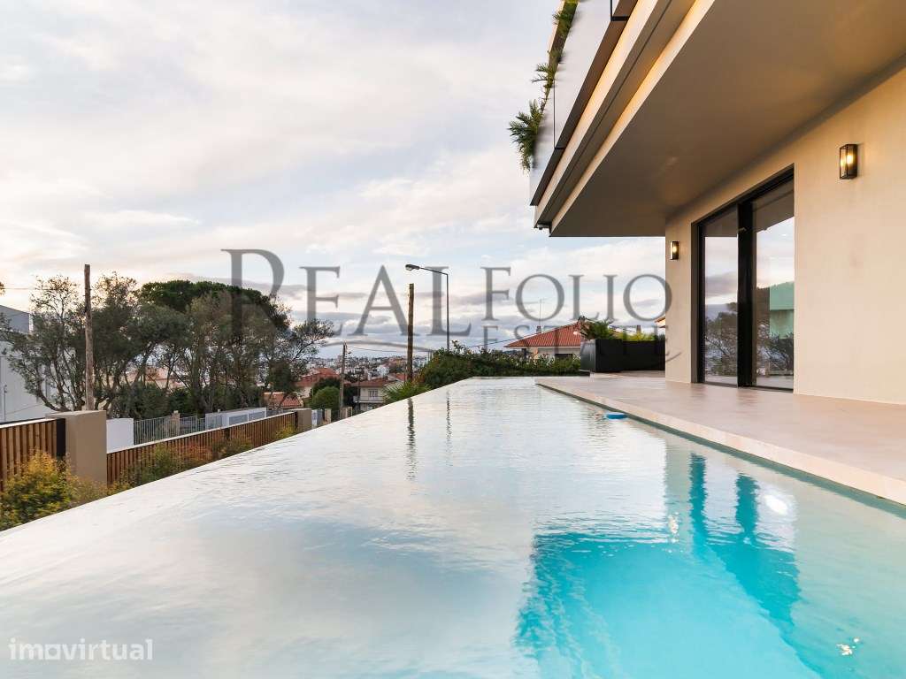 Moradia T5 com acabamentos de luxo e vista panorâmicas sobre a Baia... - Grande imagem: 4/47