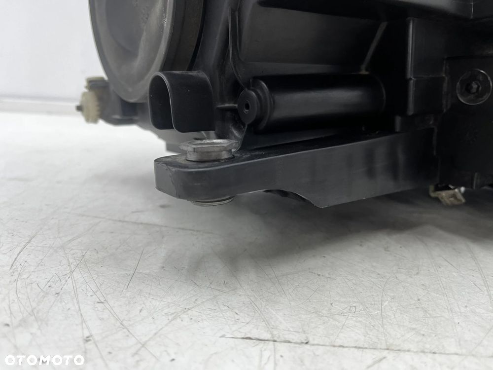 Lampa reflektor VW Tiguan 1 I 5n LIFT 10-16r. lewa przednia XENON EU skrętna doświetlanie zakrętów + - 20