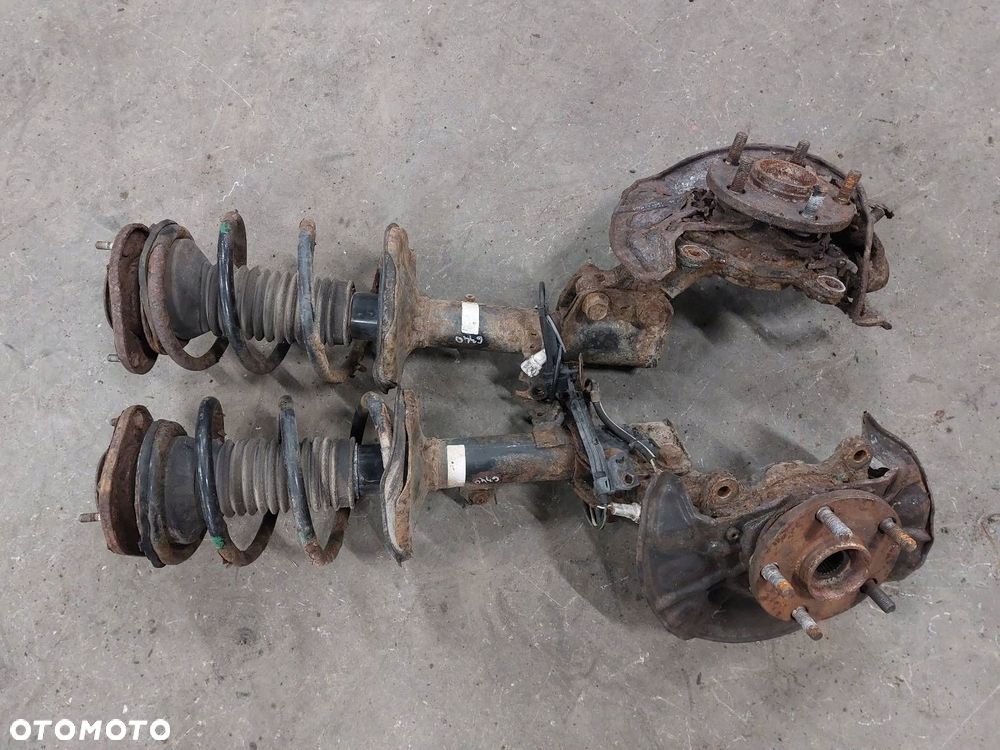 AMORTYZATOR ZWROTNICA LEWY + PRAWY PRZÓD COROLLA VERSO II 2.0 D4D - 1