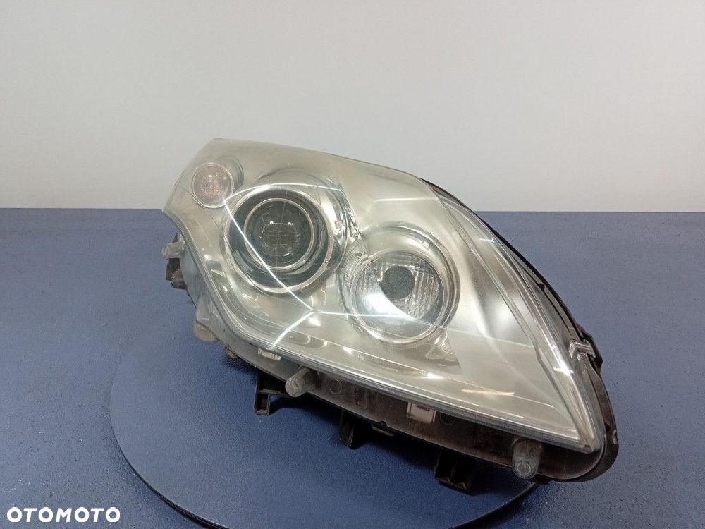 RENAULT LAGUNA III REFLEKTOR PRAWY XENON EU - 2