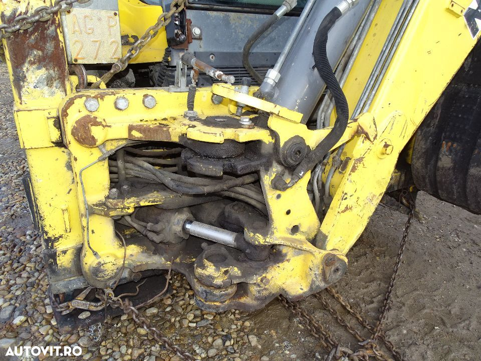 Distribuitor  fata buldoexcavator New Holland LB 110 - 5