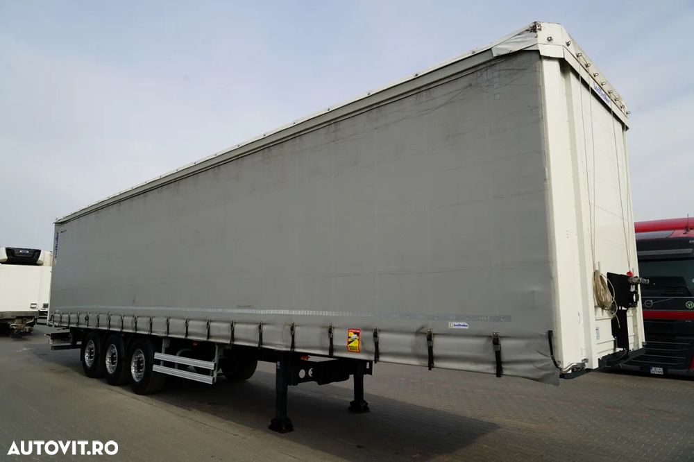 LeciTrailer CORTINĂ / STANDARD / PODEA PUTERNICĂ / AXĂ RIDICATĂ / ANVELOPE 100% / AXE - 9