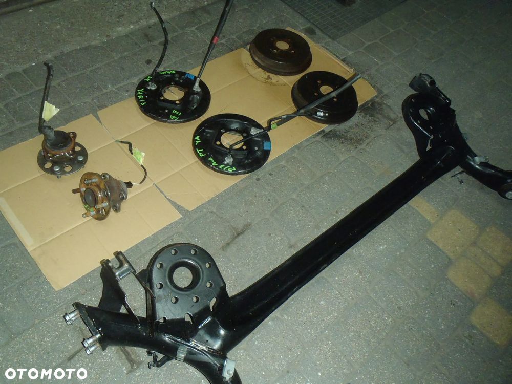 bęben szczęki cylinderek rozpierak hamulec tylny osłona tarcza kotwiczna kostka abs z zawieszenie tył toyota yaris II III 2 3 jak nowe - 5