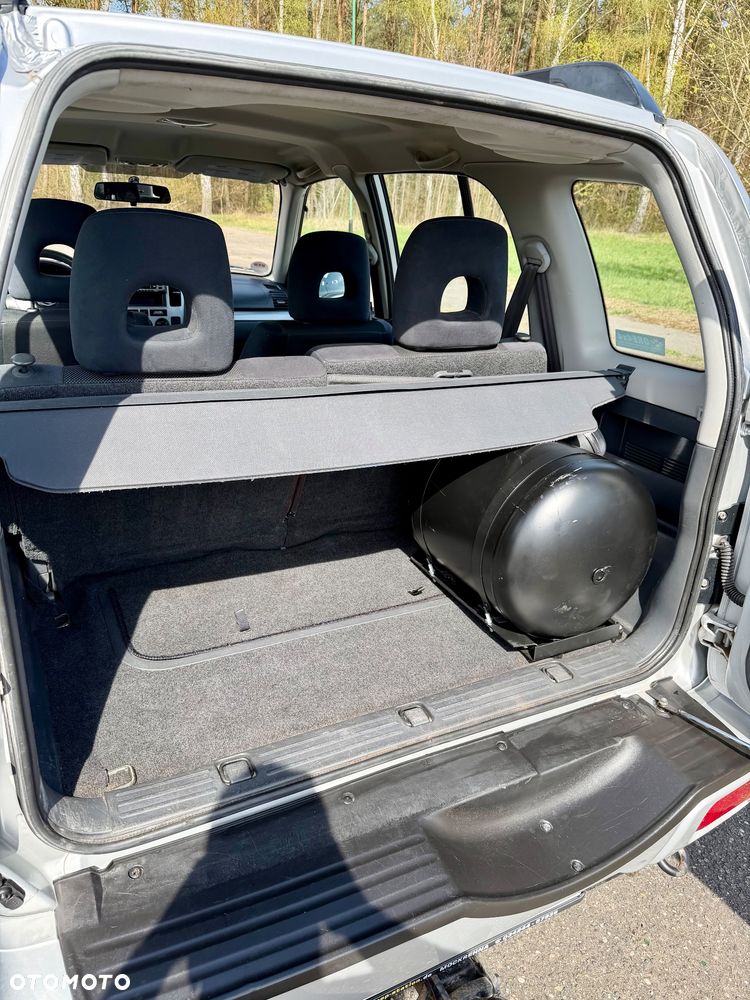 Suzuki Grand Vitara 2.0 - 7