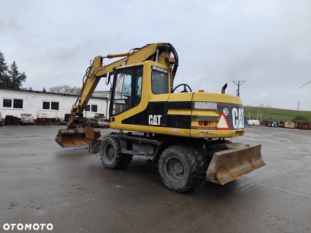 Caterpillar M 312 - 6