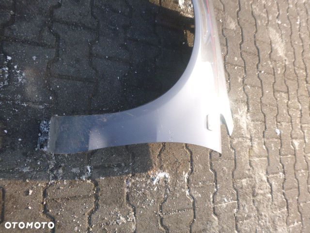 BŁOTNIK LEWY PRZÓD LEWY PRZEDNI OPEL CORSA D Z168 - 11