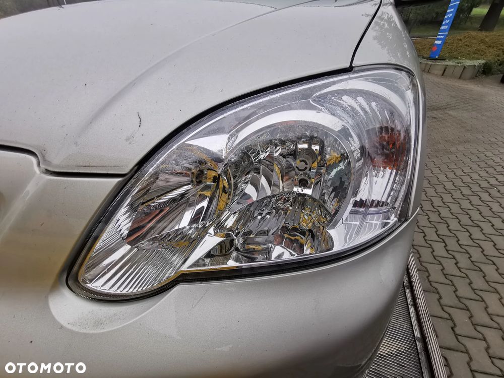 Lampy tył przód(lewa) Toyota Corolla E12 2004r 5D - 2