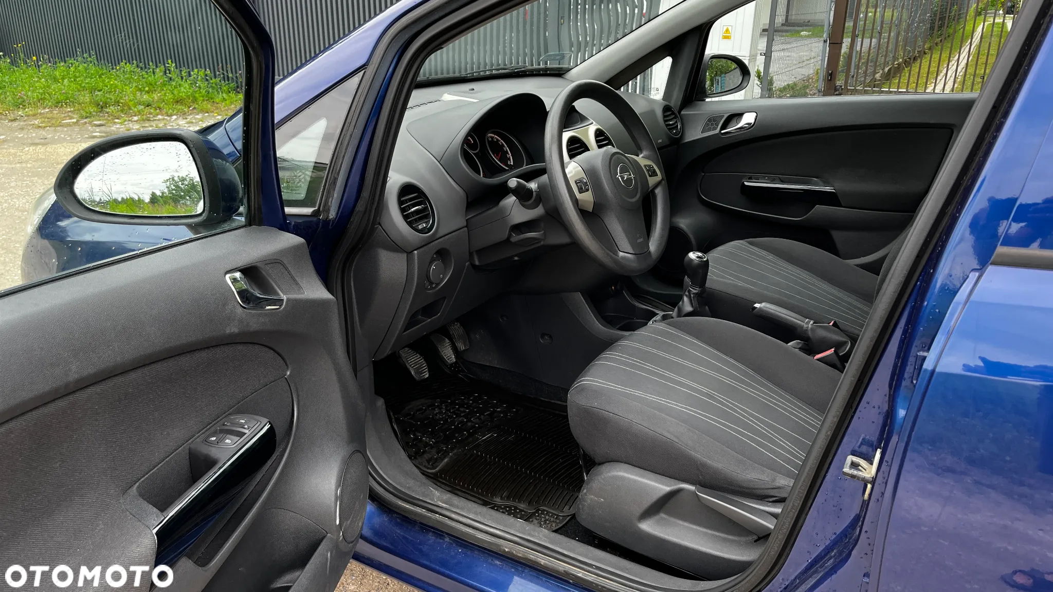 Opel Corsa 1.2 16V Enjoy - 12