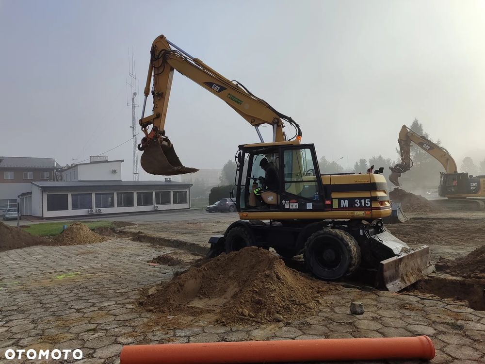 Caterpillar M315 - 3
