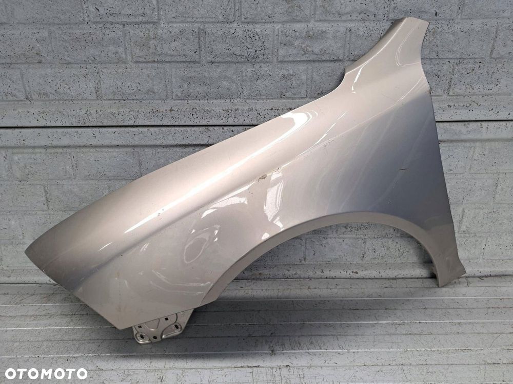 skoda octavia ii 2 04-13 błotnik lewy przód oryginał - 1