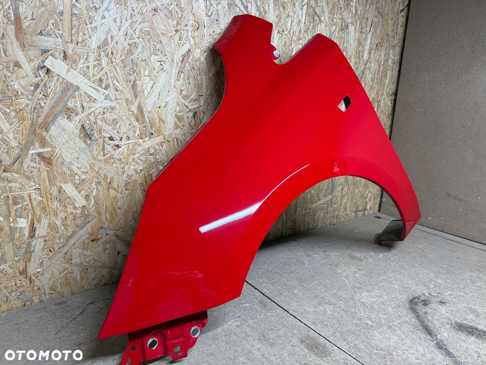 BŁOTNIK LEWY PRZÓD LEWY PRZEDNI OPEL CORSA E CZERWONY 50B - 30