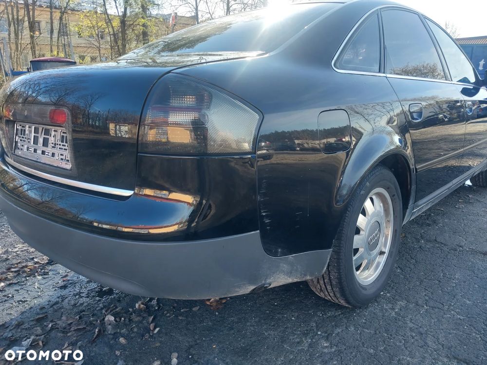 Audi A6 C5 sedan silnik kompletny 1.8 Turbo AEB turbina turbosprężarka cewka wiązka przepustnica przepływomierz kolektor skrzynia biegów DHW sprzęgło dwumasa drzwi lewe prawe klapa błotnik lusterko kolor LY9B czarny maglownica wydech tłumik lampa tył tylna blenda belka rura dolotowa przewód podłokietnik sterownik panel boczki fotele grzane alufelgi szyba dekory NA CZĘŚCI WSZYSTKIE CZĘŚCI - 12