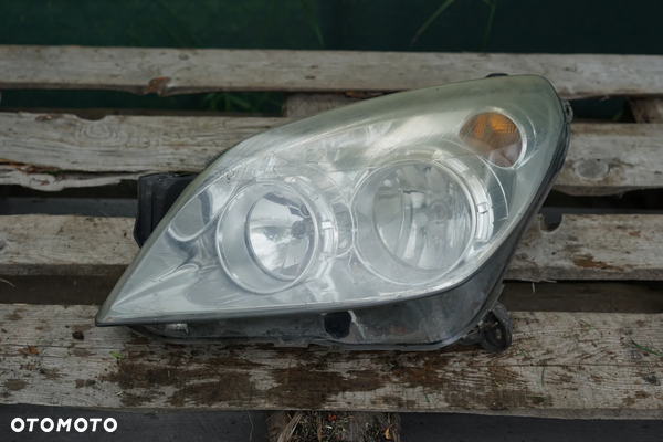 Lampa przód przednia lewa Opel Astra H III Anglik