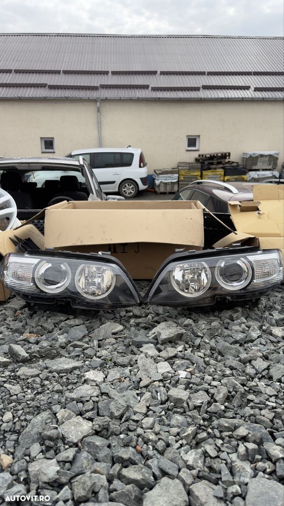 Faruri BMW X5 E53 NOI originale - 1