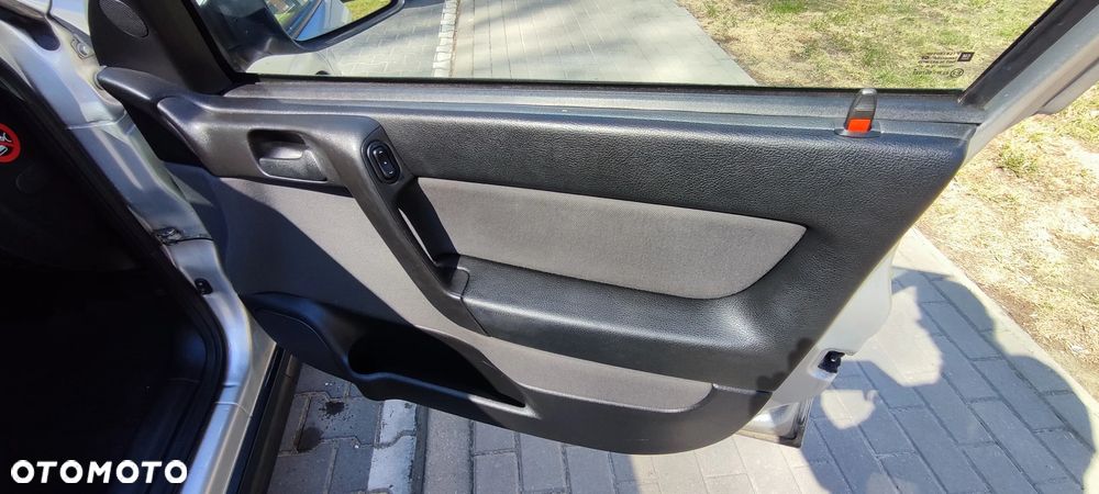 Opel Astra 1.4 111 - 13