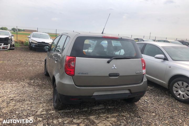 Punte spate Mitsubishi Colt Z30 [2002 - 2009] Hatchback 5-usi 1.1 MT - 4