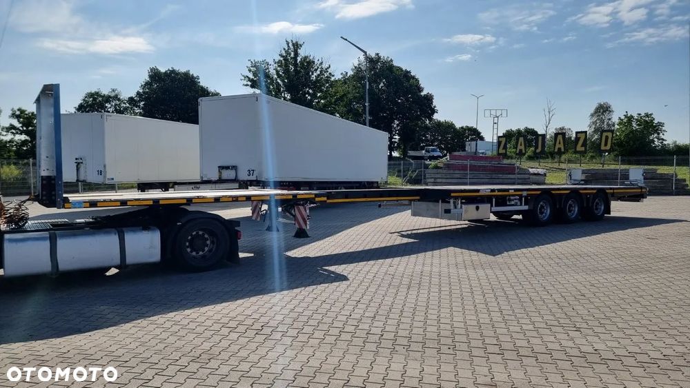 MAX Trailer platforma z hydraulicznie opuszczaną i wysuwaną rampą najazdową - 23