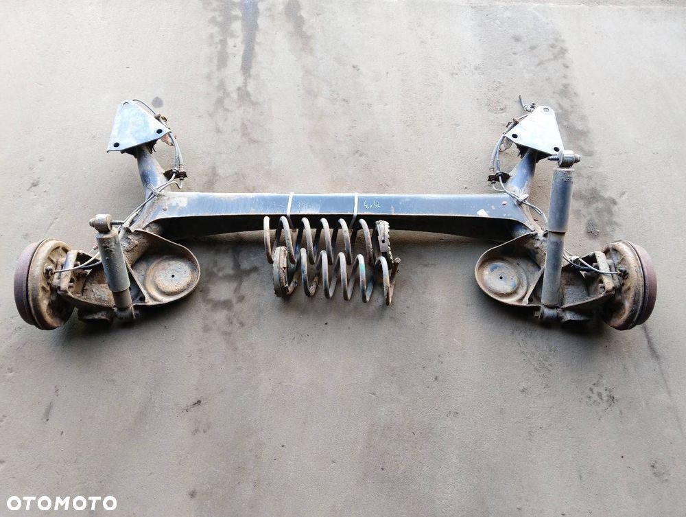 BELKA OŚ ZAWIESZENIA TYŁ BĘBNY Z ABS FIAT PANDA II - 1