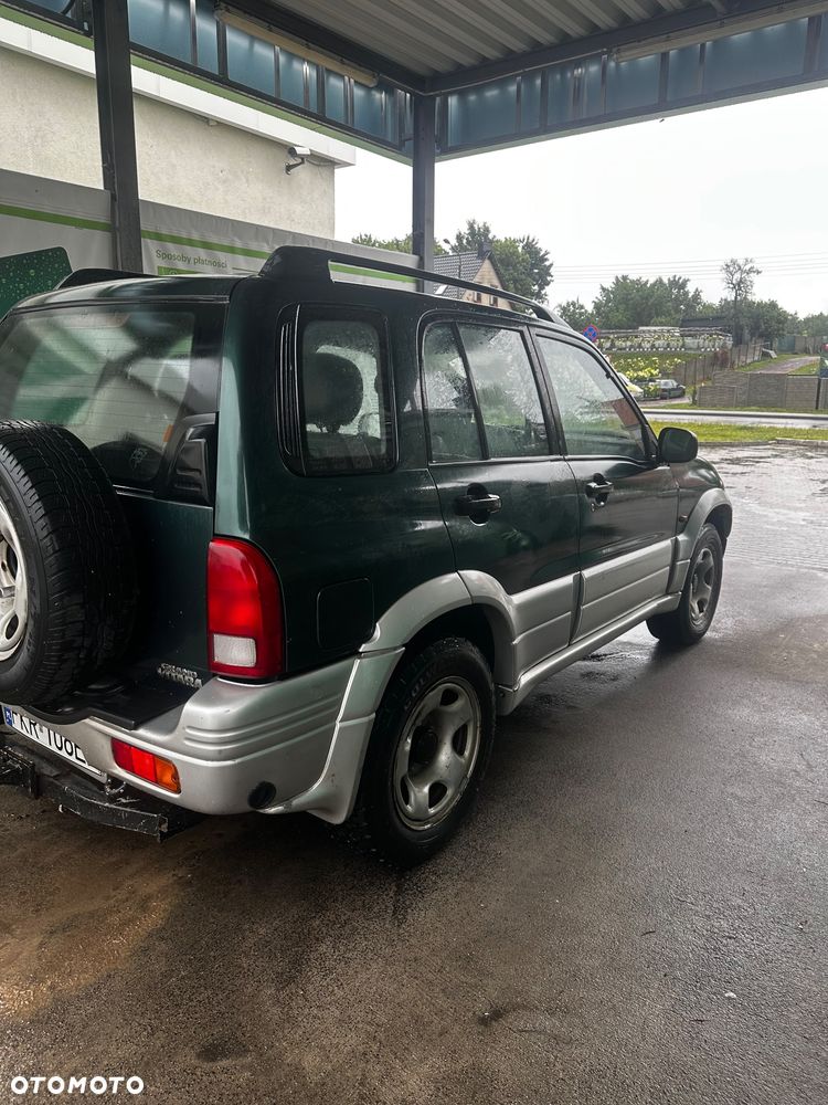 Suzuki Grand Vitara 2.0 - 7